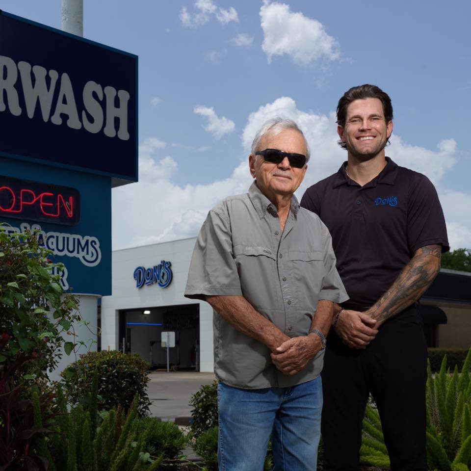 Founder Don Bruno with a member of the Don's team outside the Ryan Street car wash